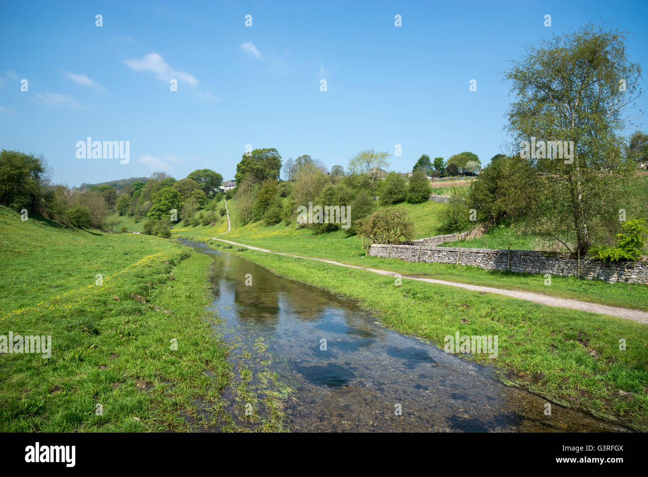 Clear water flowing through Bradford dale, Youlgreave, Derbyshire. Stock Photo