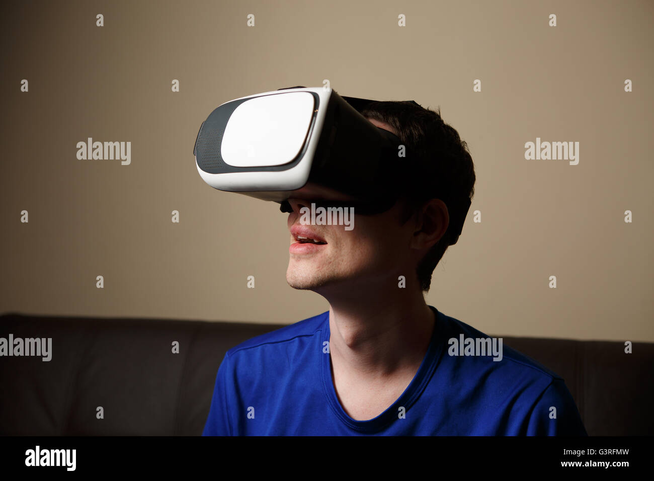 Man wearing virtual reality goggles Stock Photo - Alamy