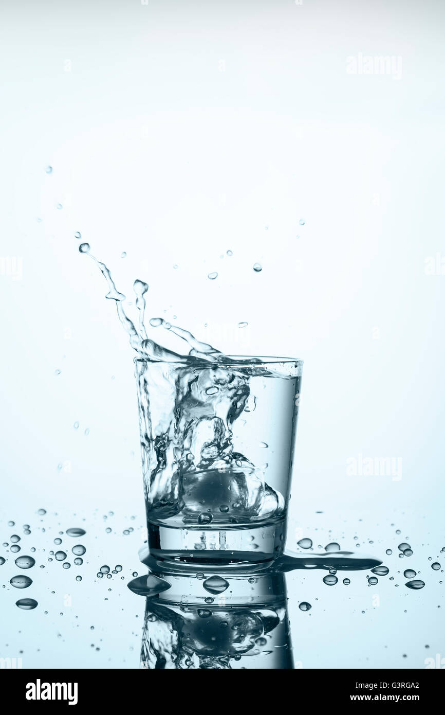 Ice drop with water splash hi-res stock photography and images - Alamy