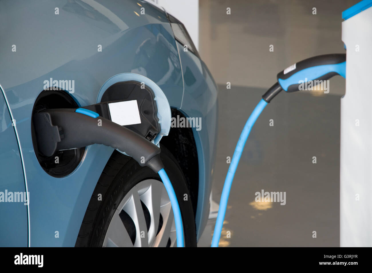 Electric car charging stand Stock Photo Alamy