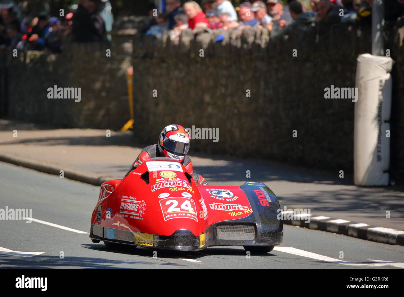 Nicholas Dukes and his partner William Moralee in their sidecar at the 2015 Tourist Trophy on the Isle of Man, UK Stock Photo