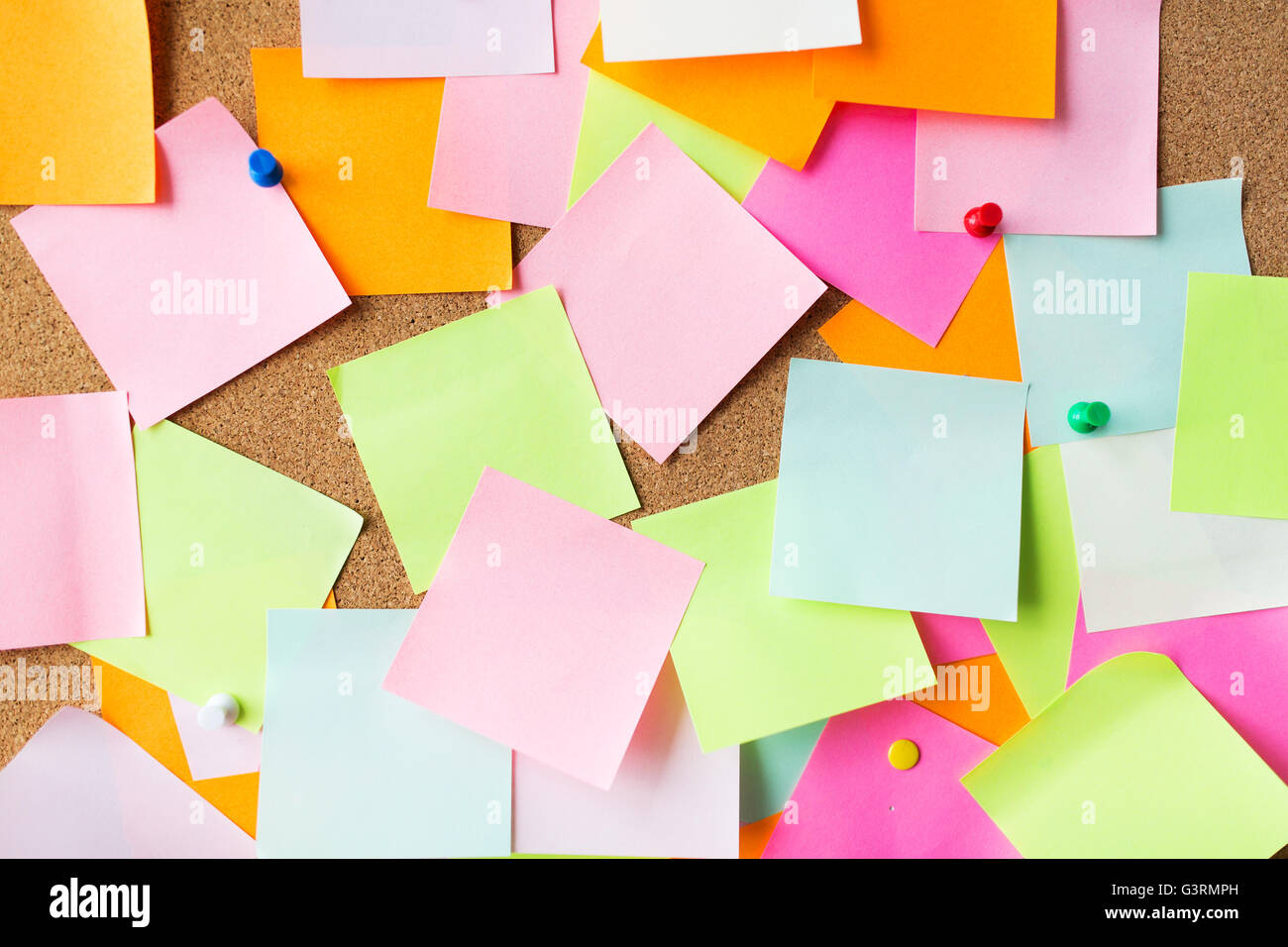 close up of blank paper stickers on cork board Stock Photo - Alamy