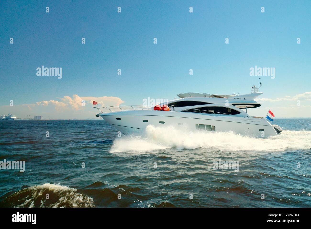 Saint Petersburg, Russia. Private Russian luxury pleasure motor yacht cruiser boat motorboat in Kronstadt Bay, Gulf of Finland Stock Photo