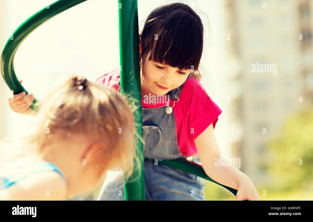 group of happy little girls on children playground Stock Photo - Alamy
