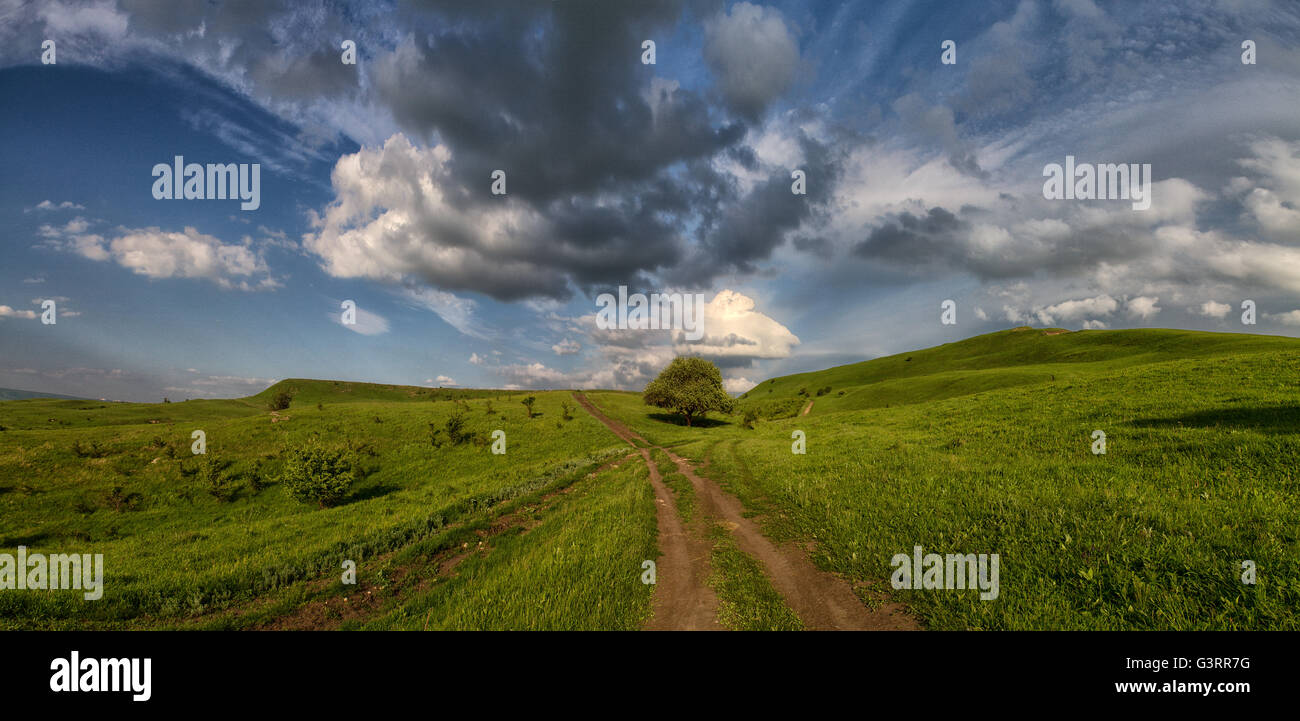 Spring landscape with Russian Caucasus green mountains Stock Photo - Alamy