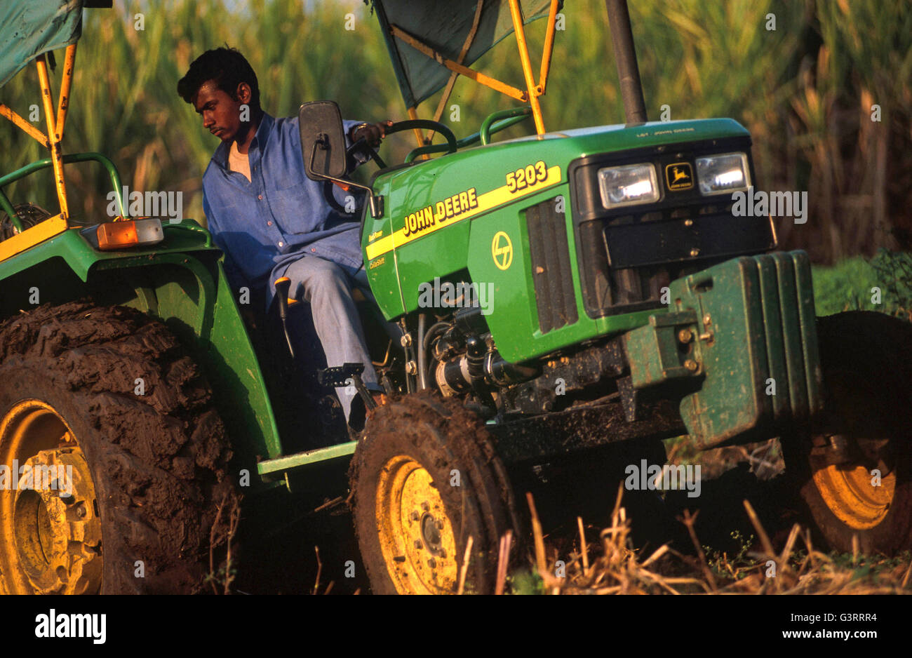 INDIA, Pune, John Deere tractor dealer in village, John Deere tractor
