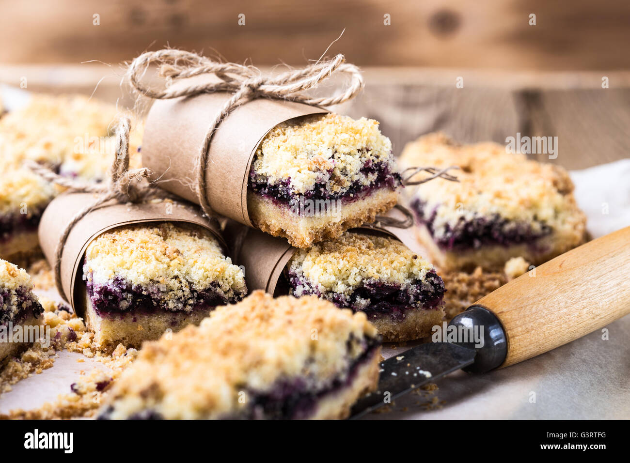 Homemade blueberries crumble bars on baking paper Stock Photo Alamy