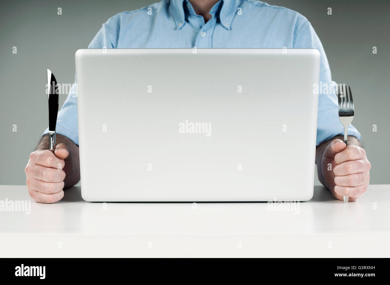 Online food order concept A man holding fork and knife Stock Photo Alamy