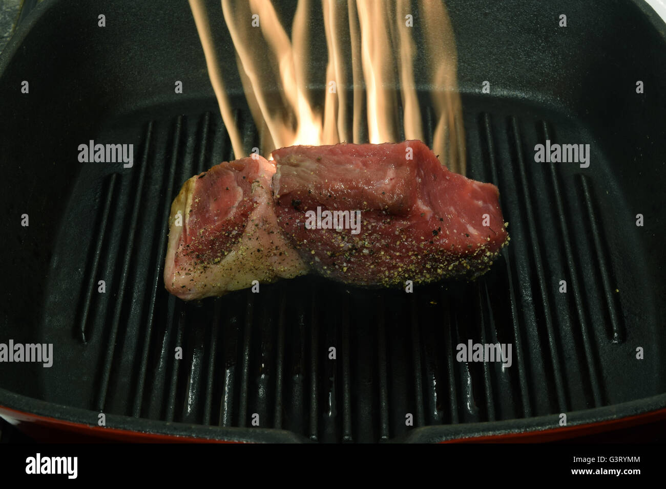 Beef Rum Steak on Fire Stock Photo Alamy