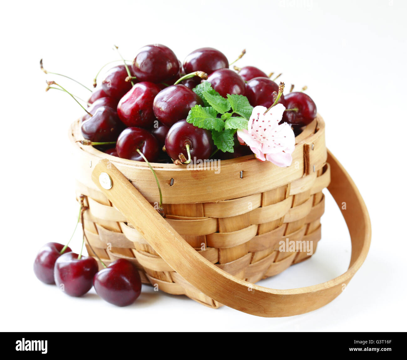 Natural organic berries cherries in a basket Stock Photo - Alamy