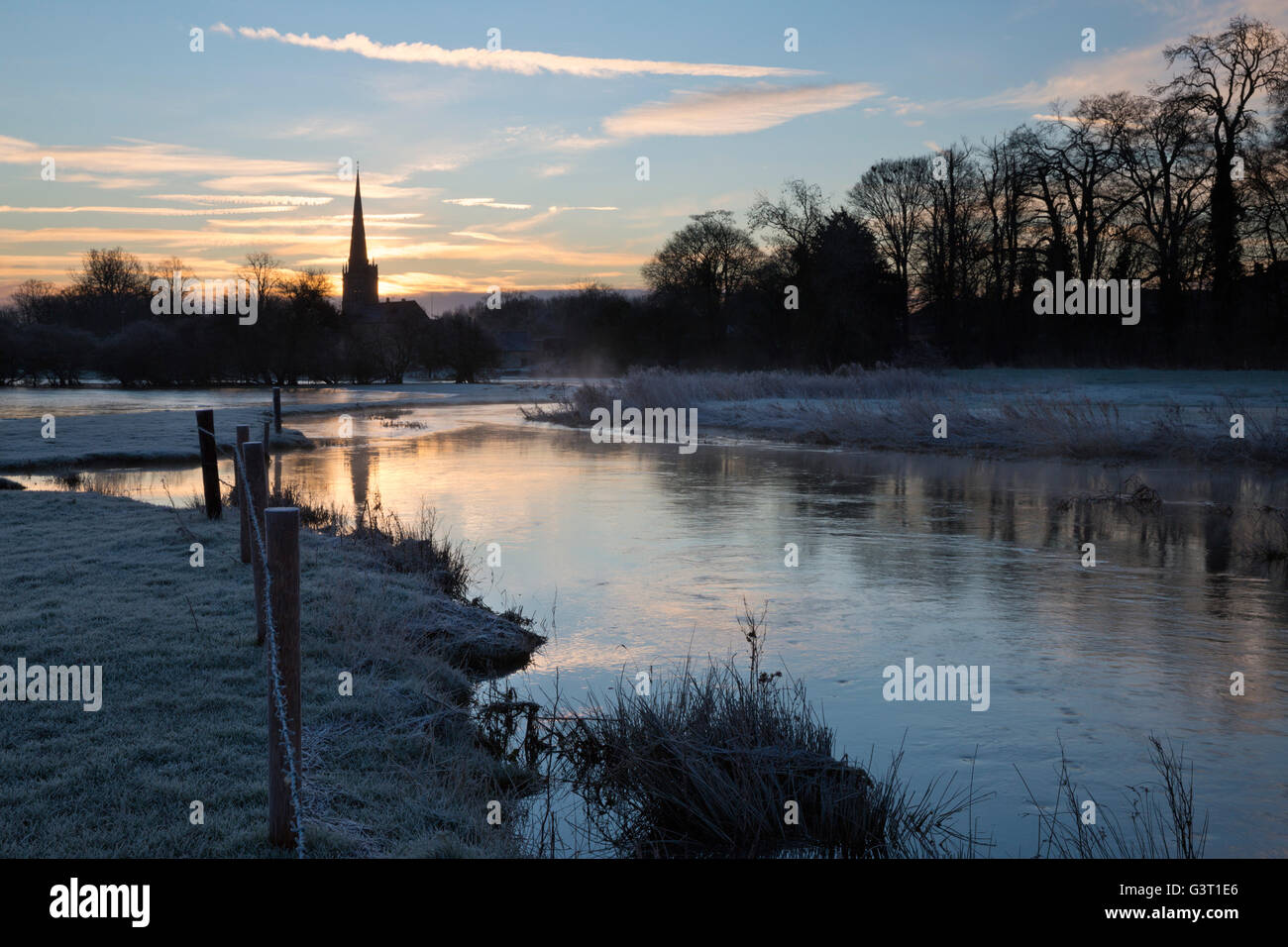 Burford church and River Windrush on frosty winter morning, Burford, Cotswolds, Oxfordshire, England, United Kingdom, Europe Stock Photo
