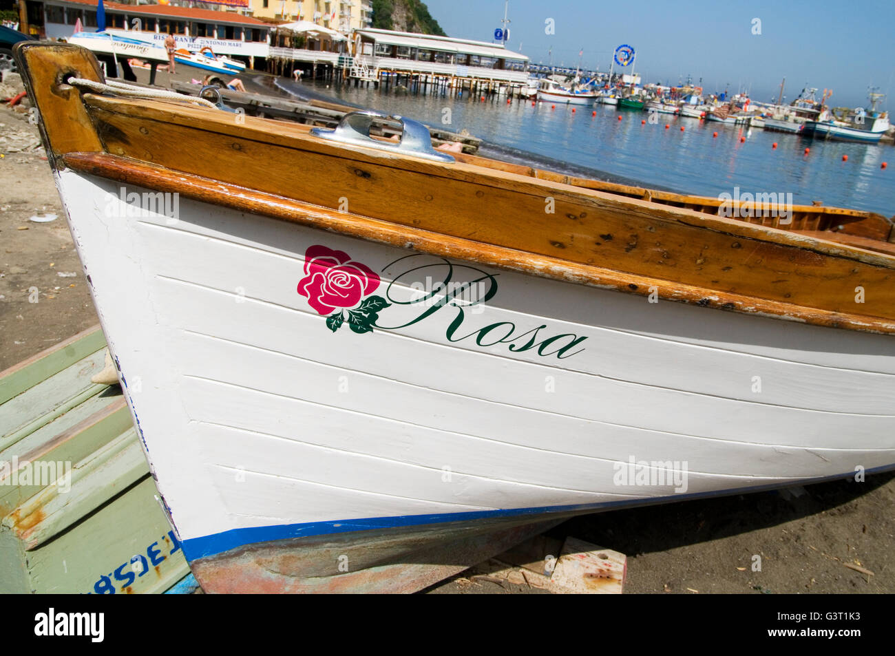 The beautifully painted boat Rosa drawn up on the beach at Sorrento, near Naples, Italy Stock Photo