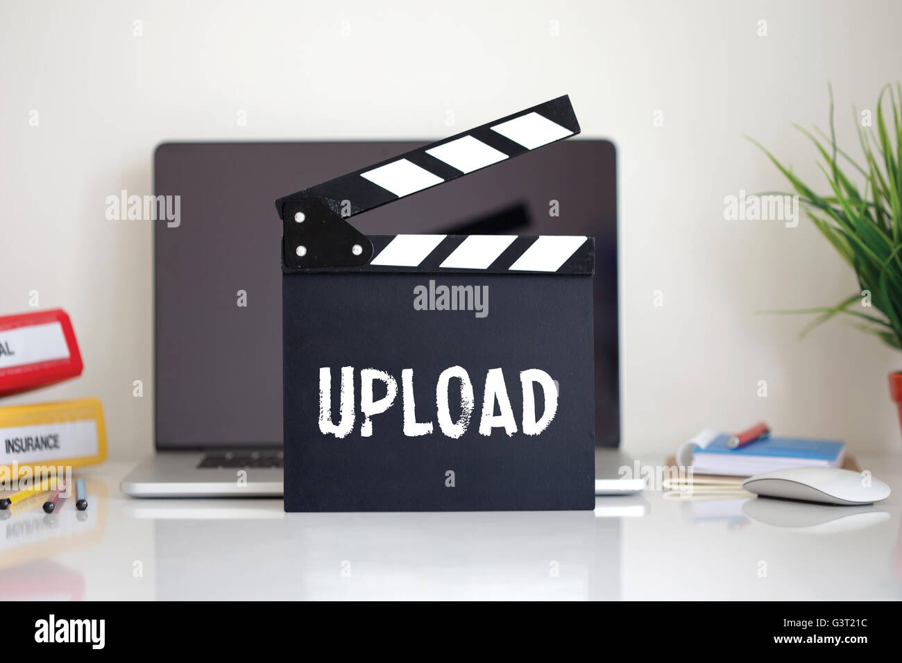 Cinema Clapper with Upload word Stock Photo