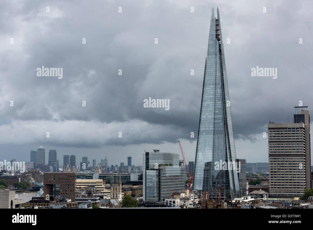 London, UK. 14 June 2016. View of the London skyline with Canary Wharf and The Shard from the viewing terrace at the Switch House of Tate Modern. Press preview of the new Tate Modern which will open to the public this weekend. Credit:  ukartpics/Alamy Live News Stock Photo