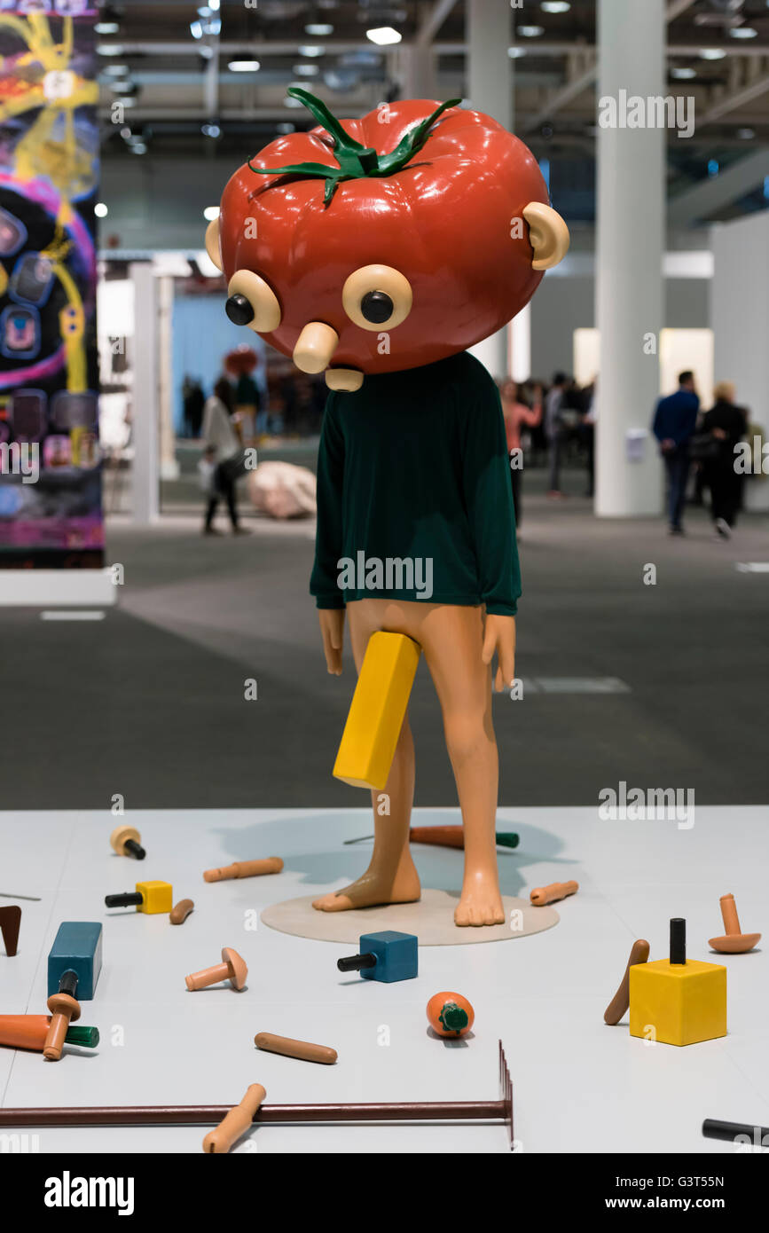 Basel, Switzerland. 14 June, 2016. The sculpture 'Tomato Head (Green)' by Paul McCarthy at the modern art show 'Art Basel 2016' in Basel, Switzerland. With 280 galleries showing works from 4,000 artists, Art Basel is one of the world's largest and most spectacular gatherings for contemporary and modern art. In 2015, the show in Basel (which also has offshoots in Hong Kong and Miami) attracted 98,000 visitors from all over the world. Credit:  Erik Tham/Alamy Live News Stock Photo