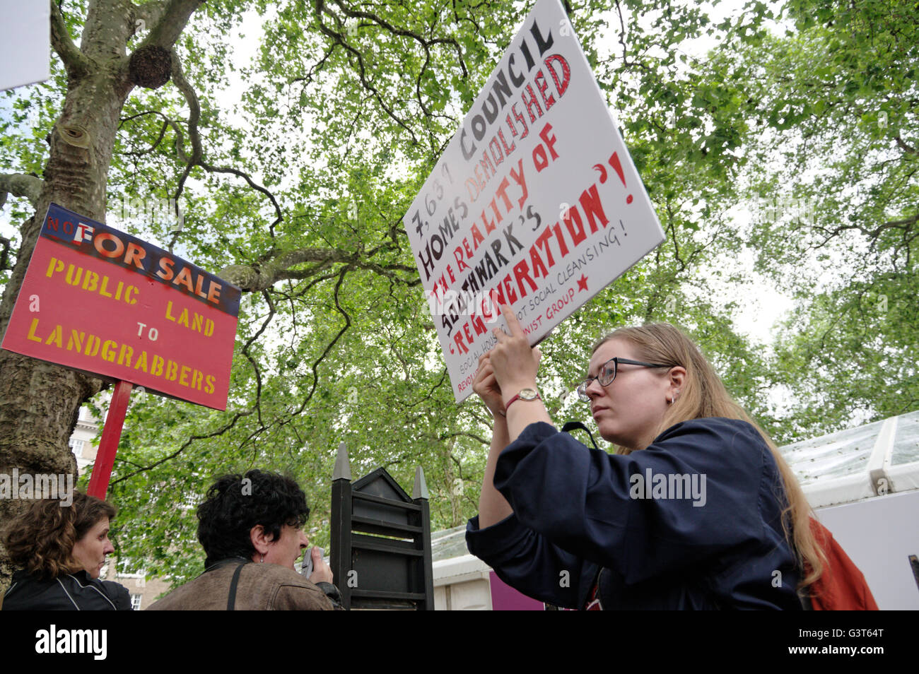 Mayfair, London, UK. 14th June 2016. Anarchist group Class War together with the Revolutionary Communist Group and other housing activists stage a noise demonstration at the entrance to the London Real Estate Forum to protest the sell-off by London local authorities of their land and council estates to property developers. Credit:  Denis McWilliams/Alamy Live News Stock Photo