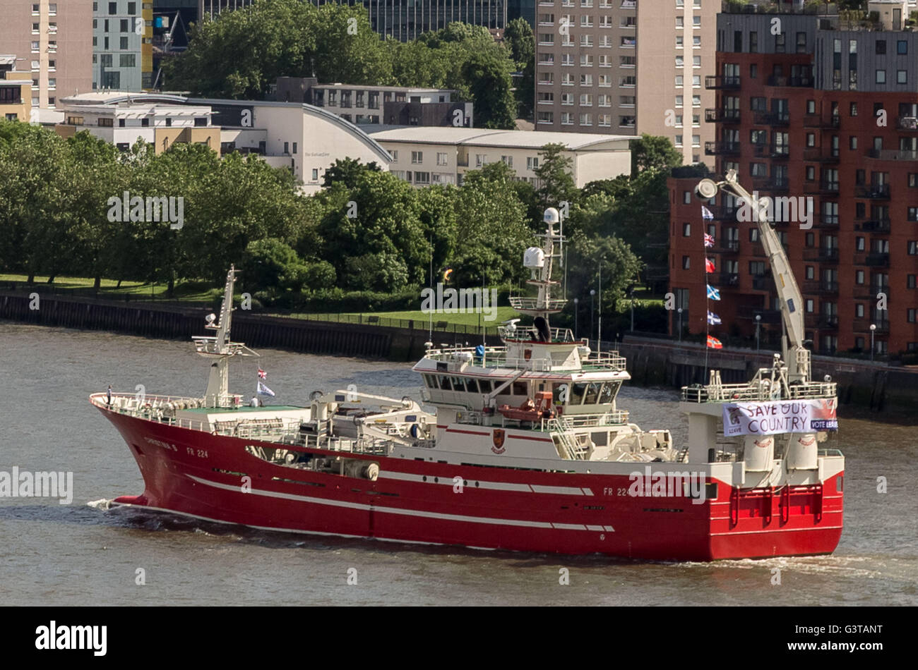 London, UK. 15th June, 2016. Flotilla of British fishermen led by UKIP leader Nigel Farage passes Canary Wharf business park buildings. The flotilla was launched early morning from Southend-on-Sea to highlight the plight of British fishermen and the continued to campaign for Britain to leave the European Union (EU) Credit:  Guy Corbishley/Alamy Live News Stock Photo