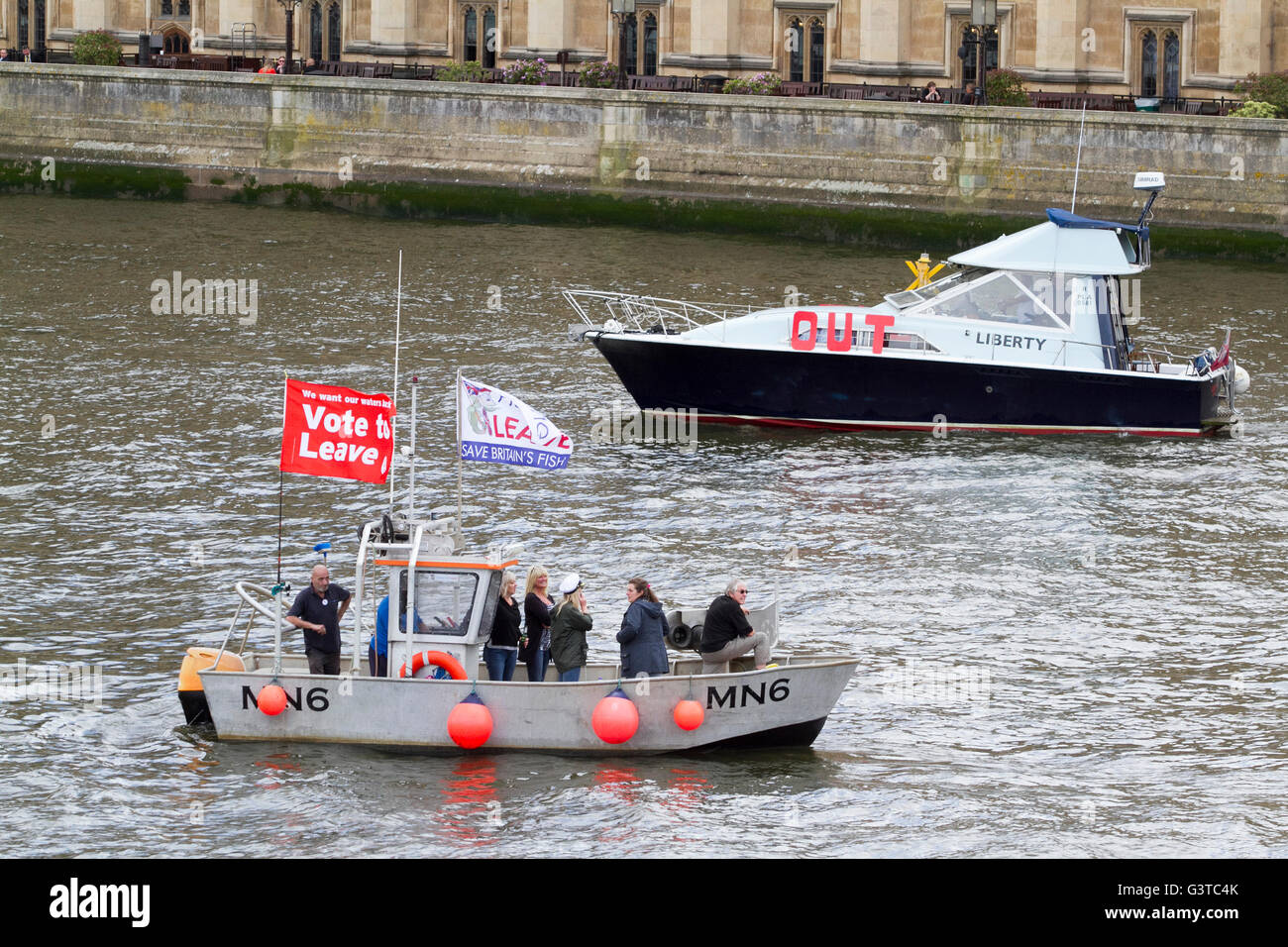 London, UK. 15th June, 2016. Vote for Leave fishing boat Flotilla made up of 30 vessels sail from Tower Bridge on River Thames to Parliament for Pro Brexit Campaign led by UKIP Leader Nigel Farage against the European Common fisheries polic Credit:  amer ghazzal/Alamy Live News Stock Photo