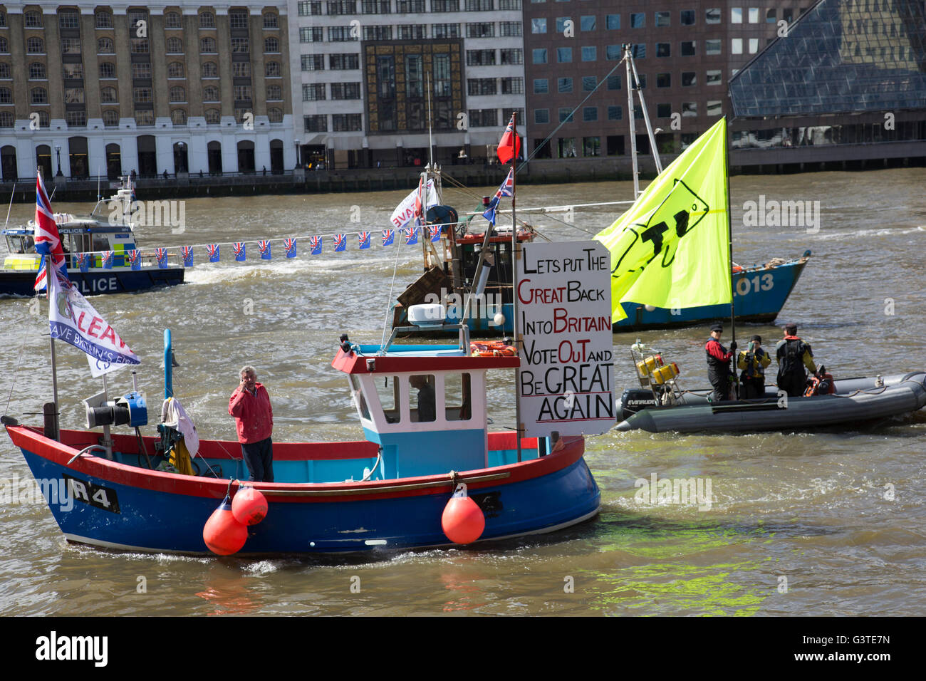 London, UK. 15th June, 2016. Flotilla of fishing vessels heading up the Thames to make the case for Brexit in the EU Referendum on June 15th in London, United Kingdom. The flotilla was organised by Scottish skippers as part of the Fishing for Leave campaign which is against European regulation of the fishing industry, and the CFP Common Fisheries Policy. Between 30 and 35 trawlers travelled up the Thames, through Tower Bridge and moored in the Pool of London. Stock Photo