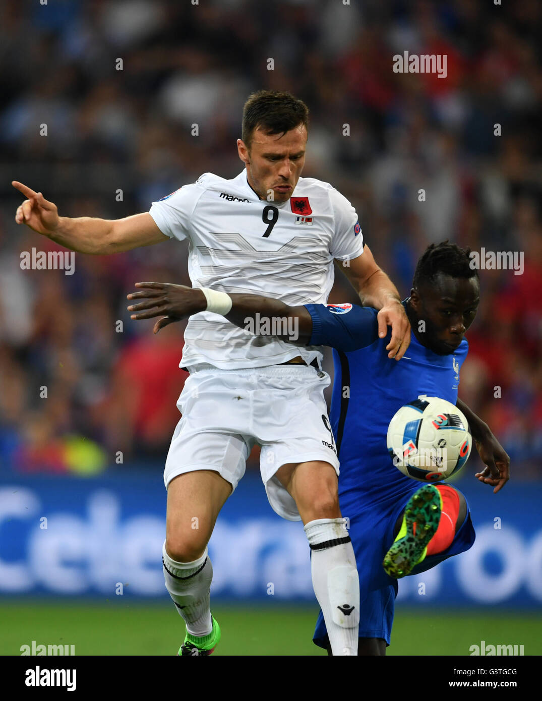 Marseille, France. 15th June, 2016. Bacary Sagna (R) of France vies with Ledian Memushaj of Albania during the Euro 2016 Group A soccer match between France and Albania in Marseille, France, June 15, 2016. Credit:  Tao Xiyi/Xinhua/Alamy Live News Stock Photo