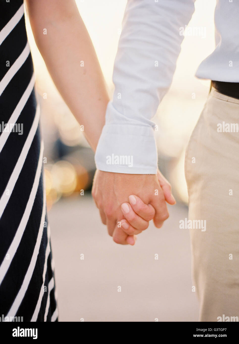 Sweden, Halland, Couple holding hands Stock Photo