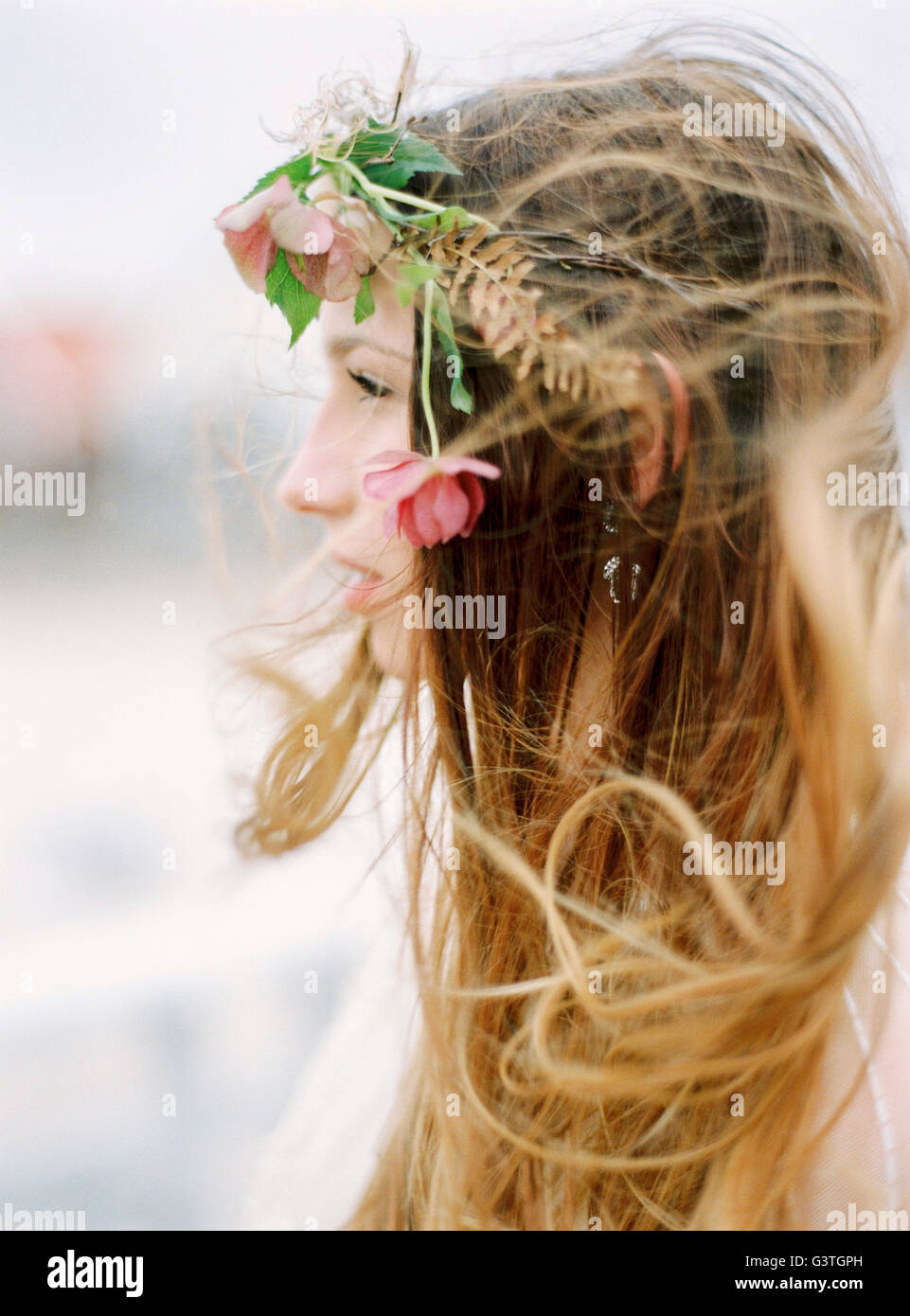 Profile young woman flowers in hair hi-res stock photography and images -  Alamy