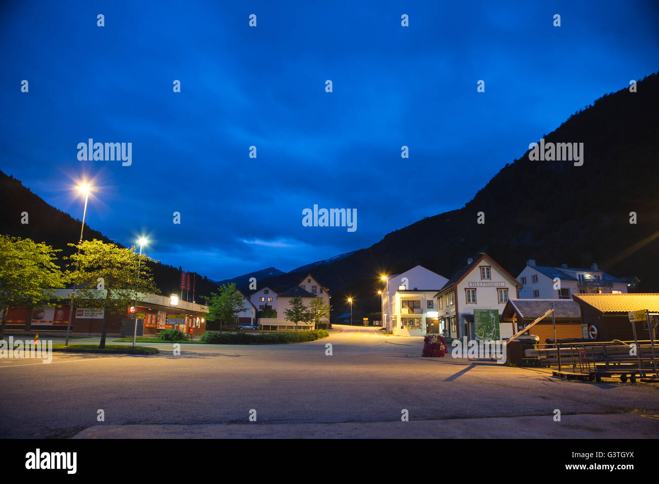 Norway, More og Romsdal, Sunnmore, Eidsdal, View of buildings in town at dusk Stock Photo