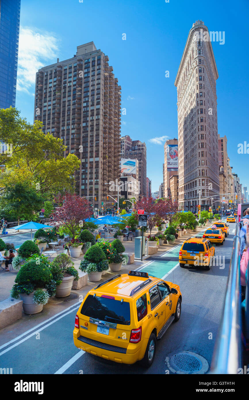USA, New York State, New York City, Manhattan, Yellow taxis and Flatiron Building Stock Photo