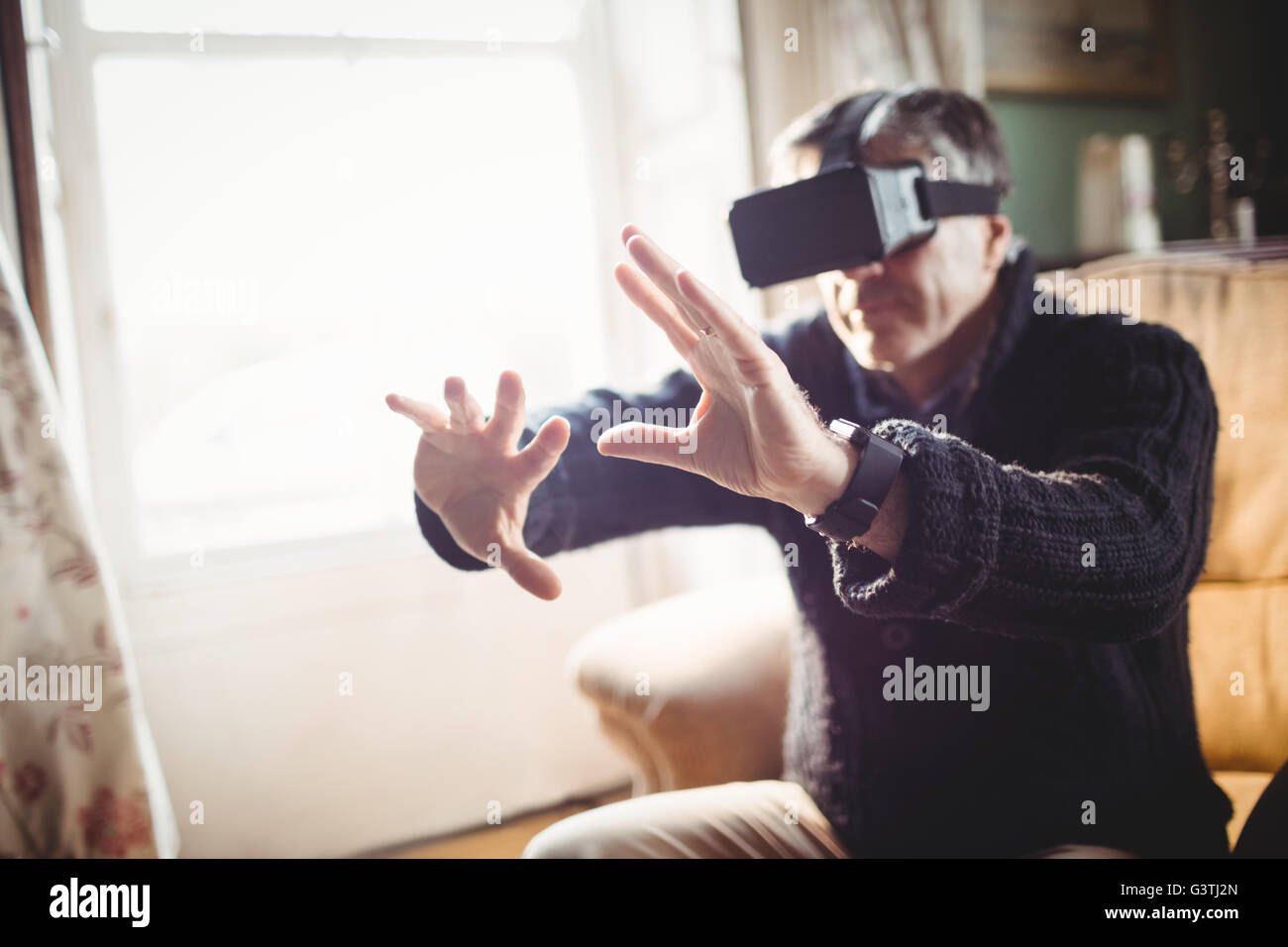 Man wearing smart glasses Stock Photo