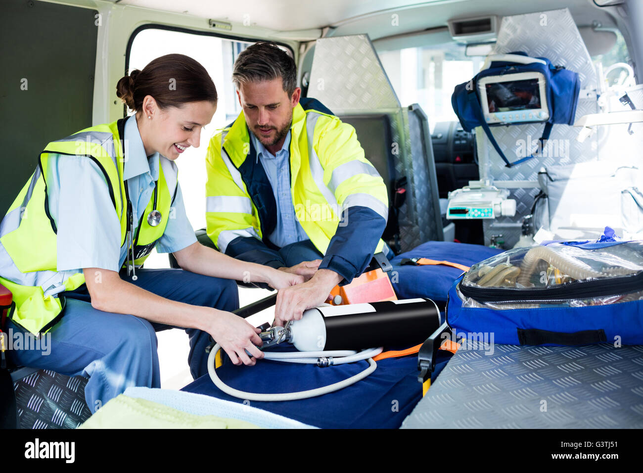 Ambulance crew preparing their tools Stock Photo