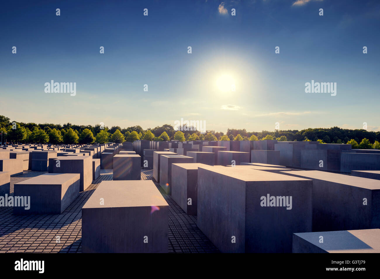 Germany, Berlin, Sun over Monument to the Murdered Jews of Europe Stock Photo