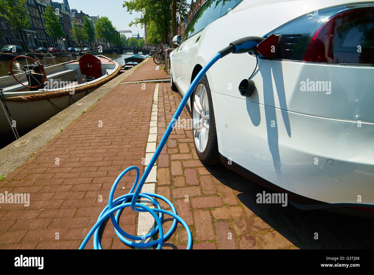 Electric Car Charging in Amsterdam, Netherlands Stock Photo Alamy