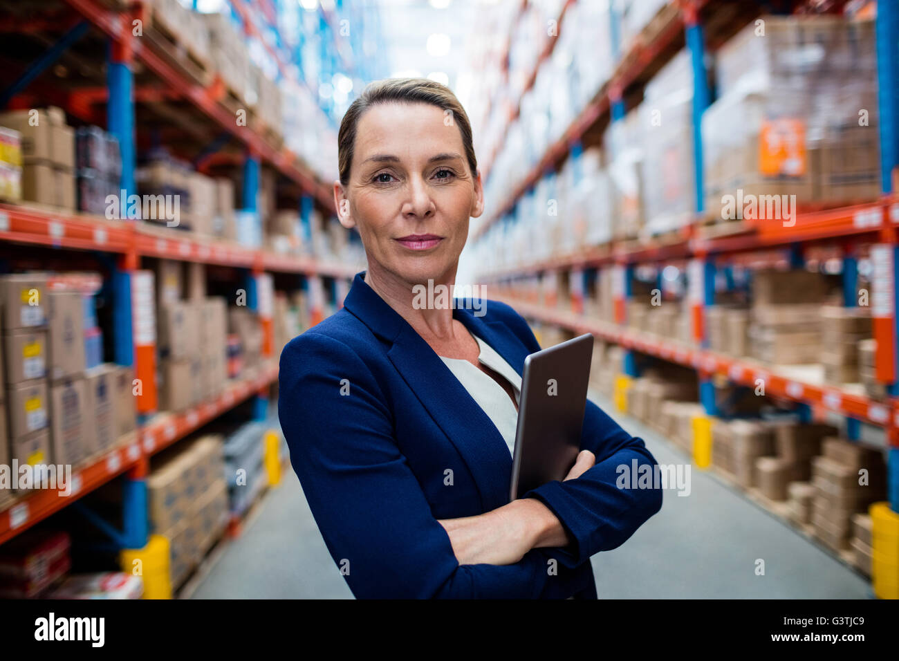 Portrait of warehouse manager standing Stock Photo
