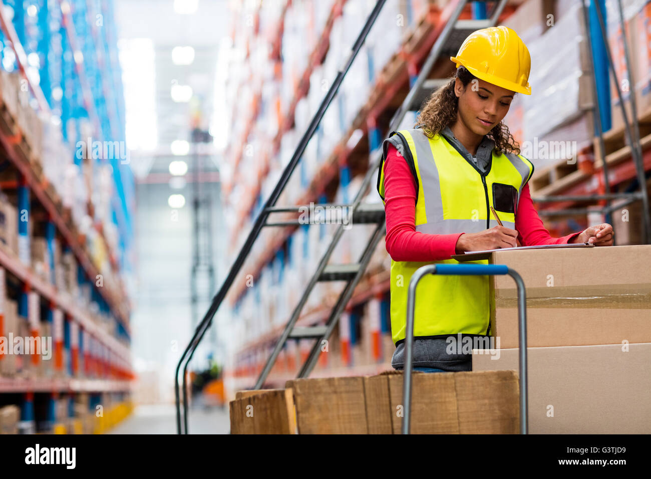 Woman worker doing inventory Stock Photo