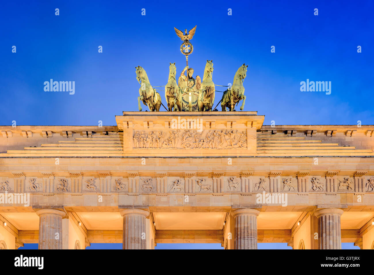 Germany, Berlin, Illuminated statue on top of Brandenburg Gate Stock Photo