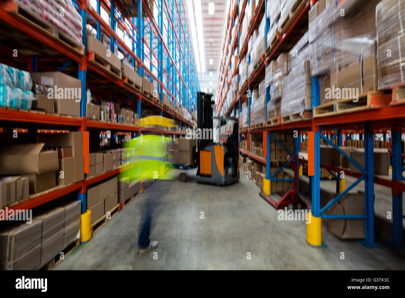 Forklift in warehouse Stock Photo Alamy