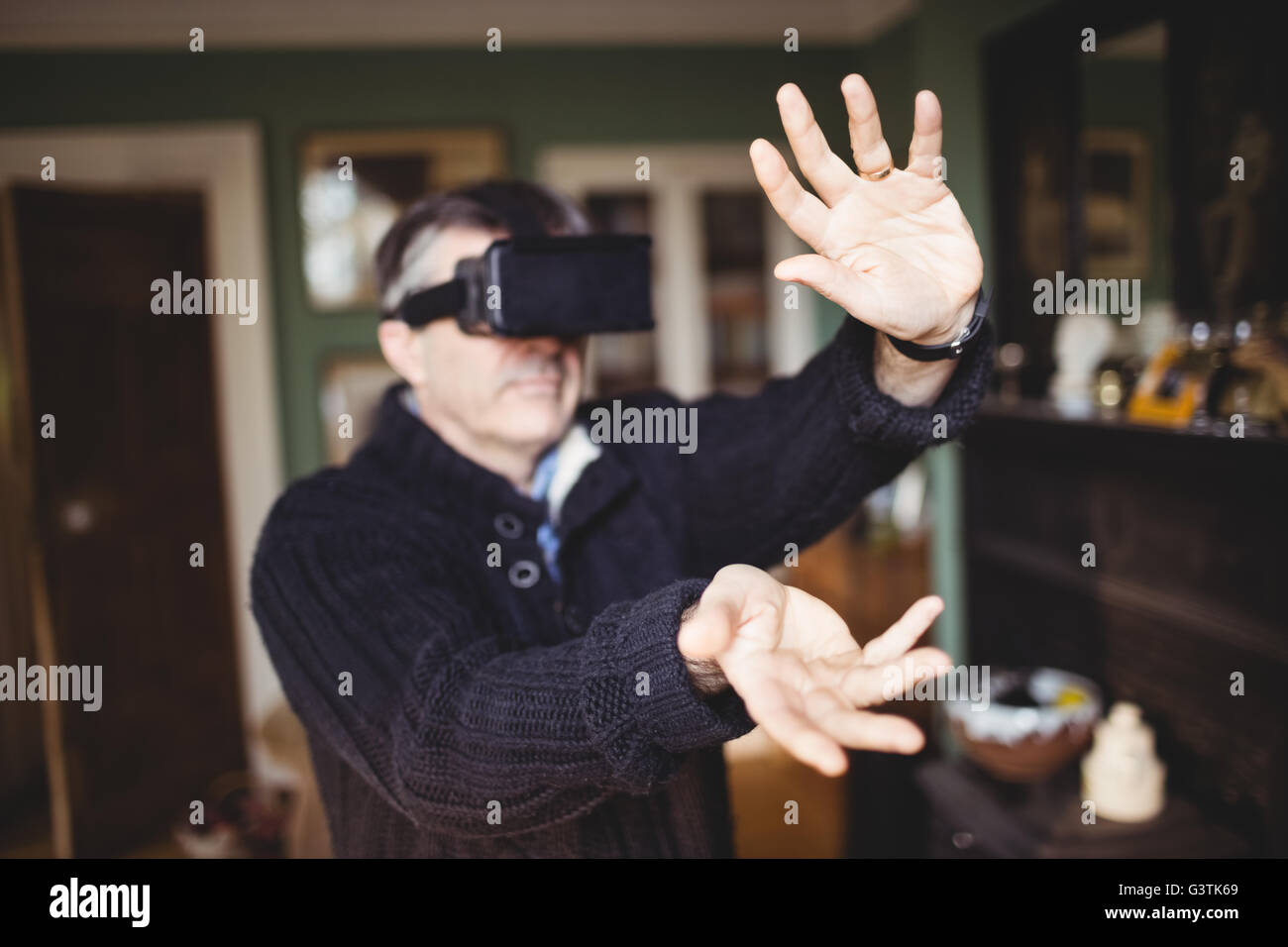 Focused man enjoying wearing smart glasses Stock Photo