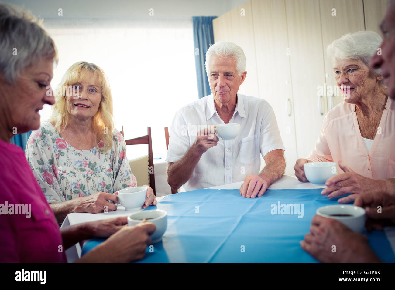 Group of seniors drinking coffee Stock Photo Alamy