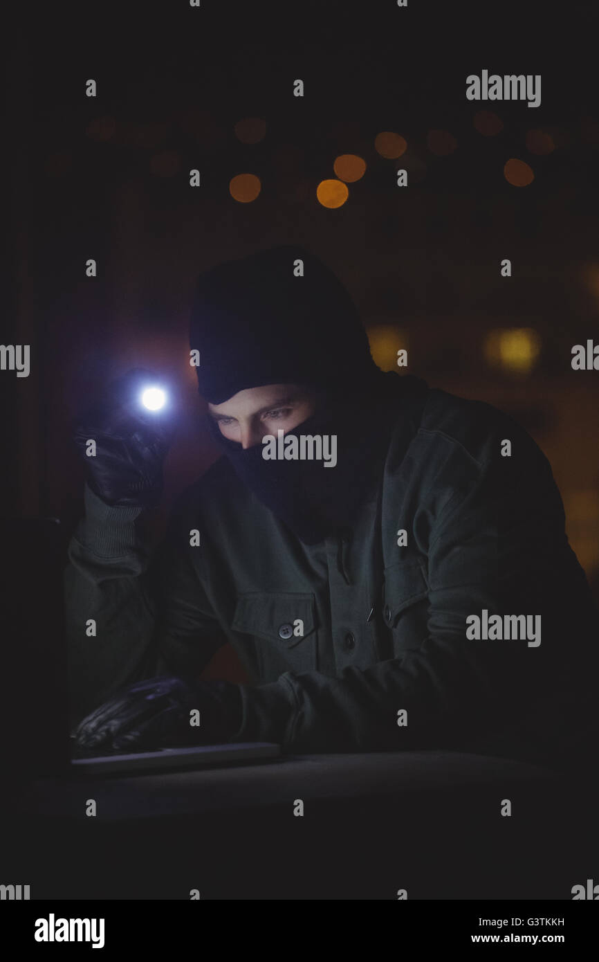 Hacker man mask typing hi-res stock photography and images - Alamy