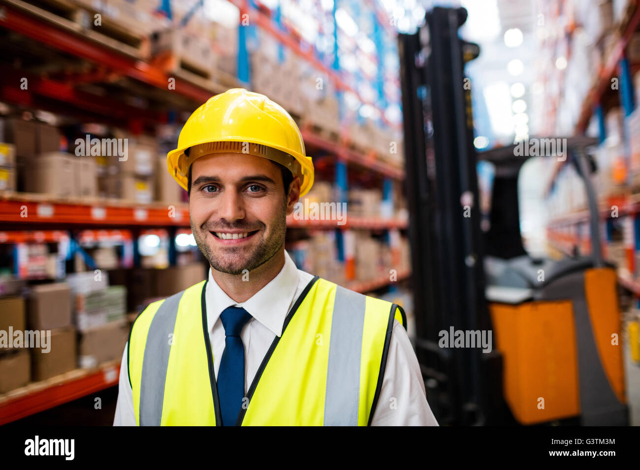 Smiling warehouse manager Stock Photo