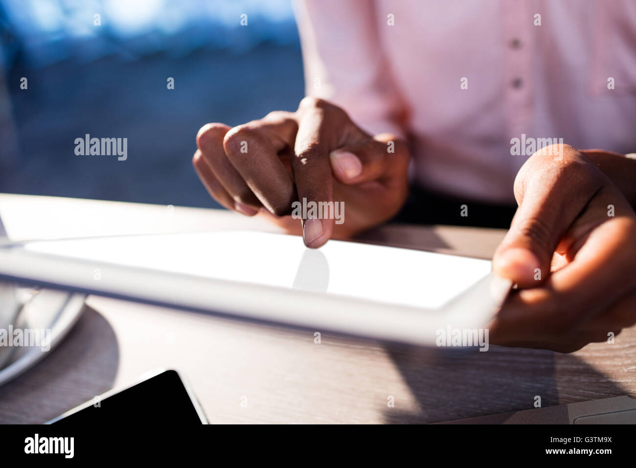 Business people using a tablet computer Stock Photo