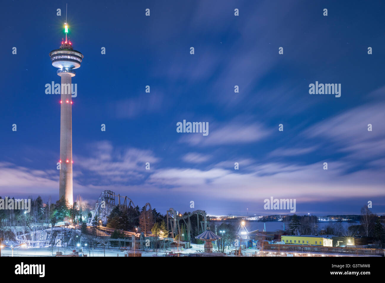 Finland, Pirkanmaa, Tampere, Nasijarvi, Illuminated communications tower at night Stock Photo