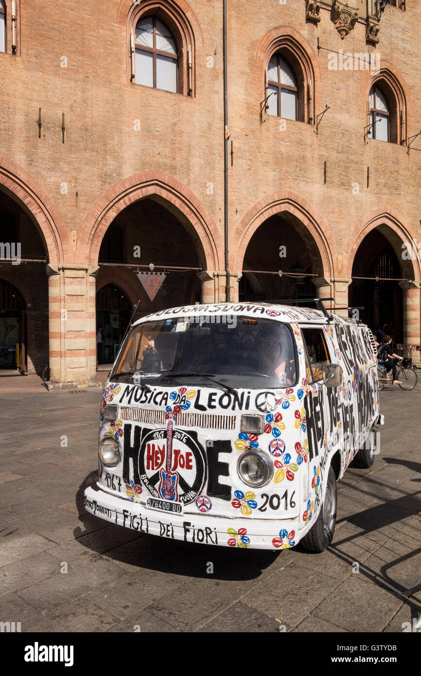 Volkswagen minibus belonging to Hey Joe musical group in the Piazza Maggiore, Bologna, Italy. Stock Photo