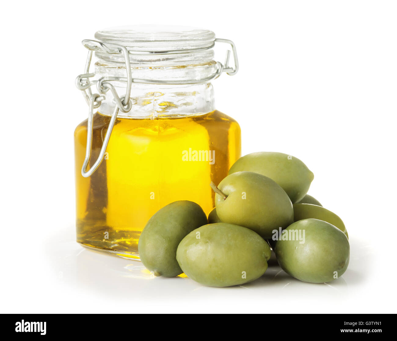 Olive oil in a glass bottle, olives isolated on a white background ...