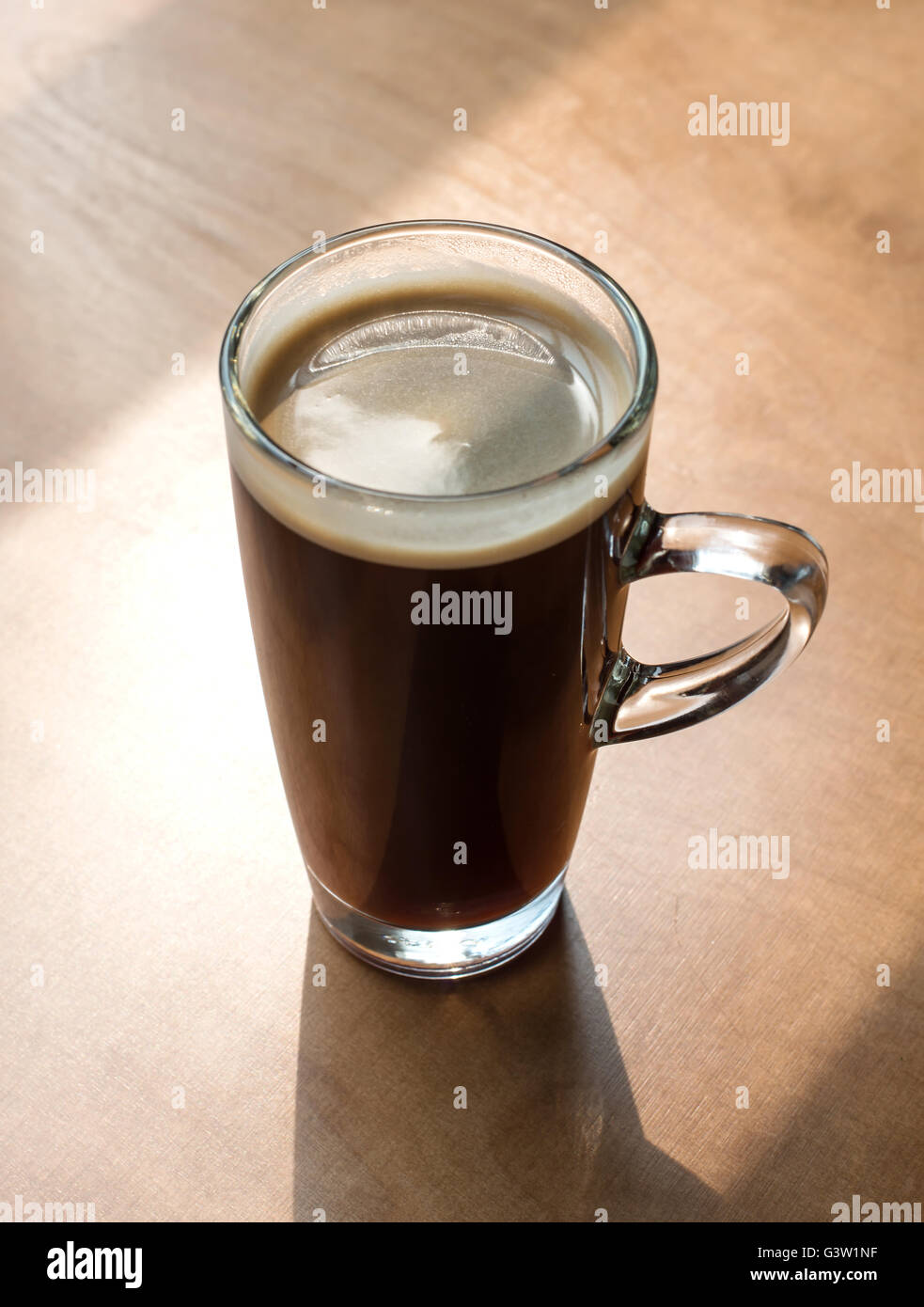 Hot coffee (americano) on the table in the morning Stock Photo
