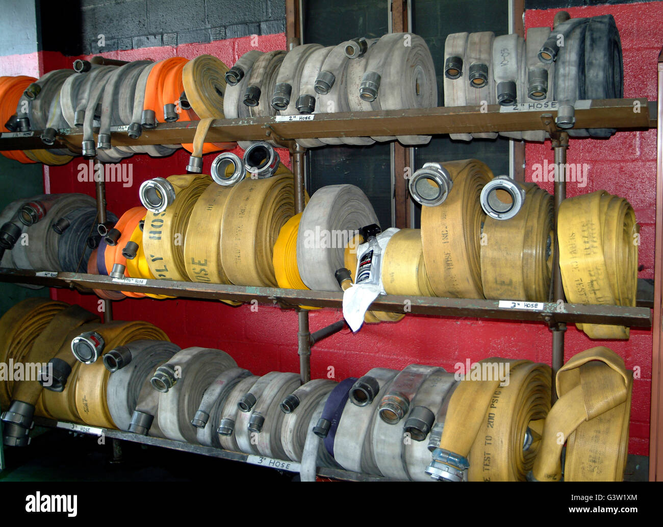 racks of fire hose in the engine room at the Bladensburg Fire Dept in Bladensburg, md Stock Photo