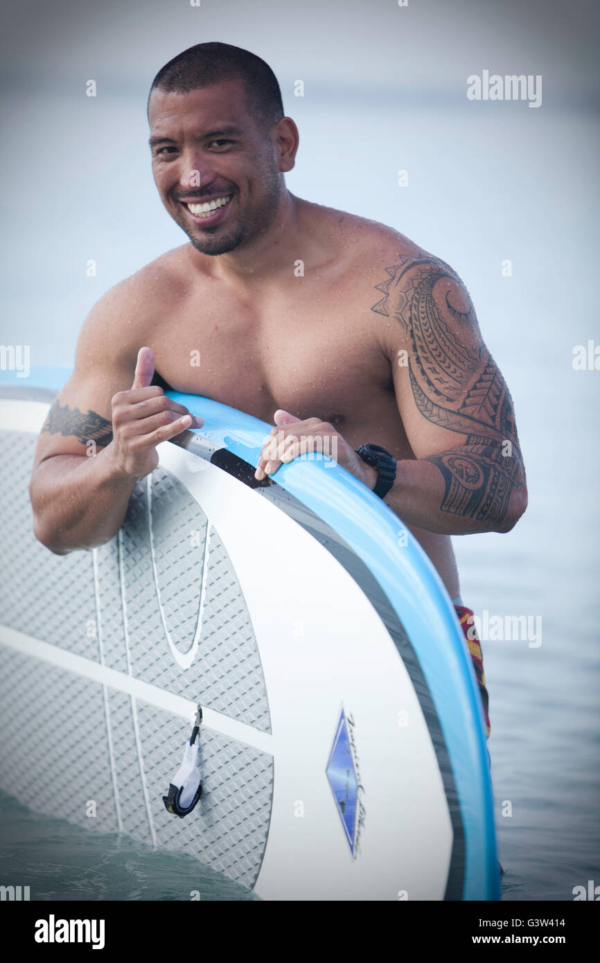 Stand up paddle boarding fun at Ala Moana Beach Park, Honolulu, Oahu