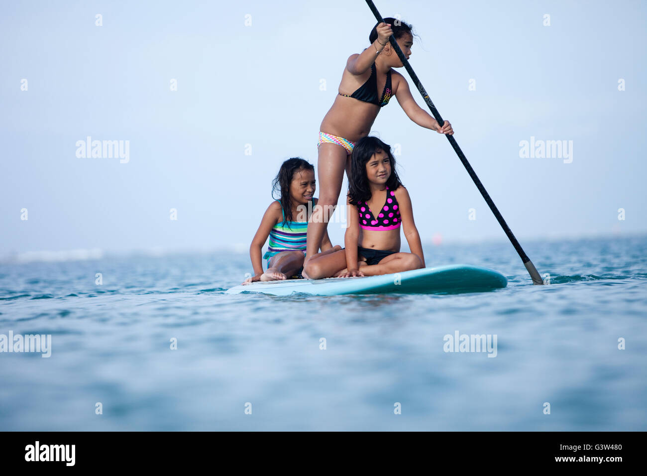 Stand up paddle boarding fun at Ala Moana Beach Park, Honolulu, Oahu,  Hawaii Stock Photo - Alamy