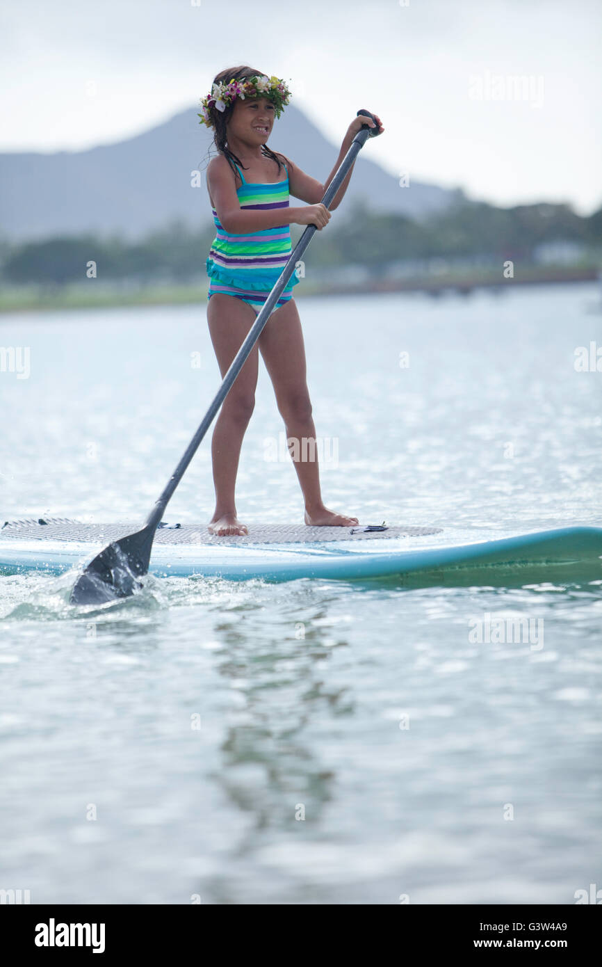 Stand up paddle boarding fun at Ala Moana Beach Park, Honolulu, Oahu