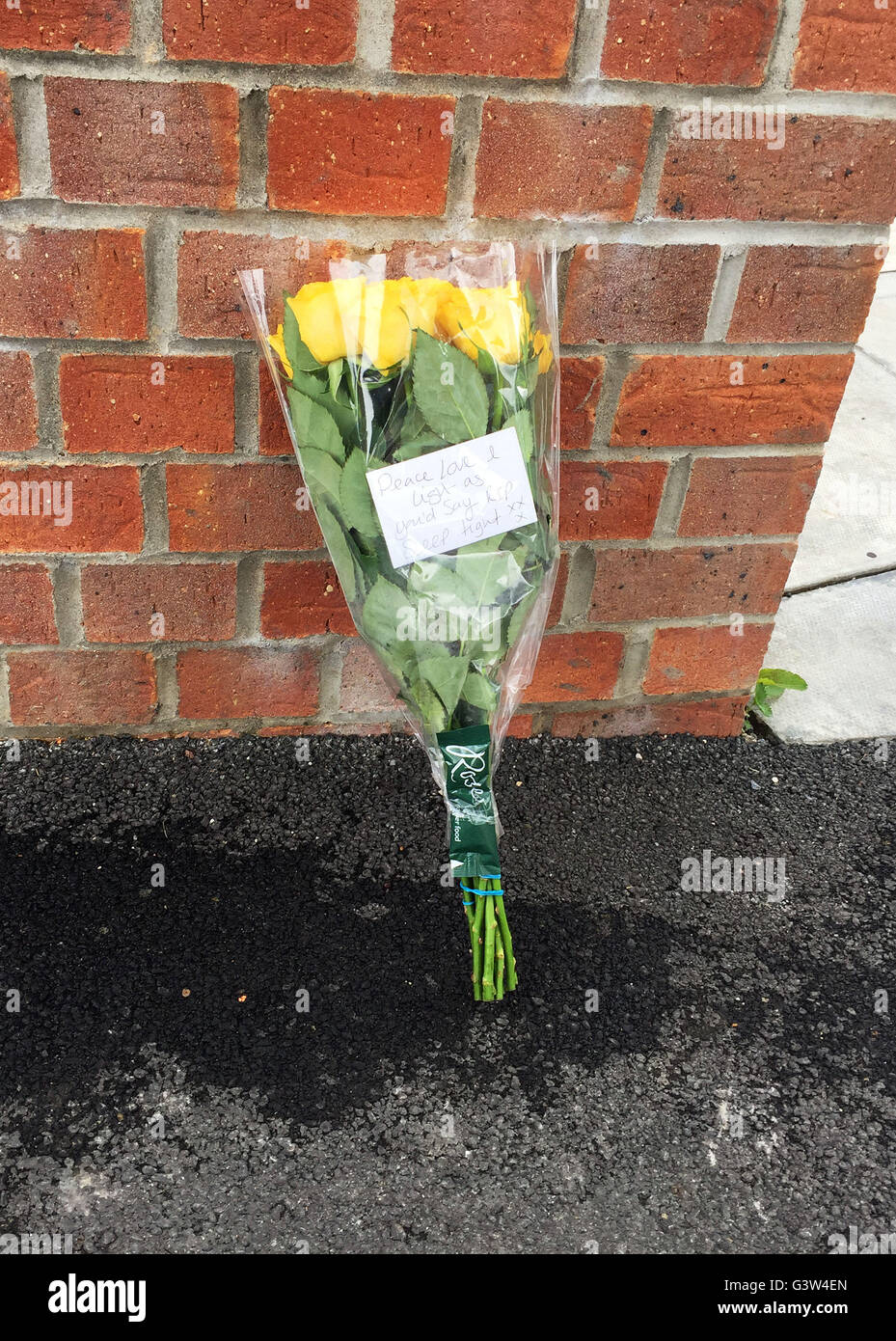 A floral tribute left in Maes y Bwlch, Llanelli, where a man died following an incident involving a Taser on Tuesday evening. Stock Photo